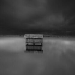 house surrounded by water